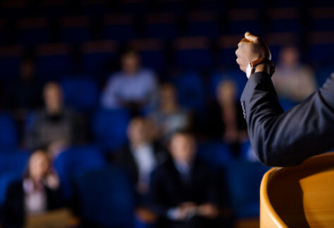 male-business-executive-giving-speech